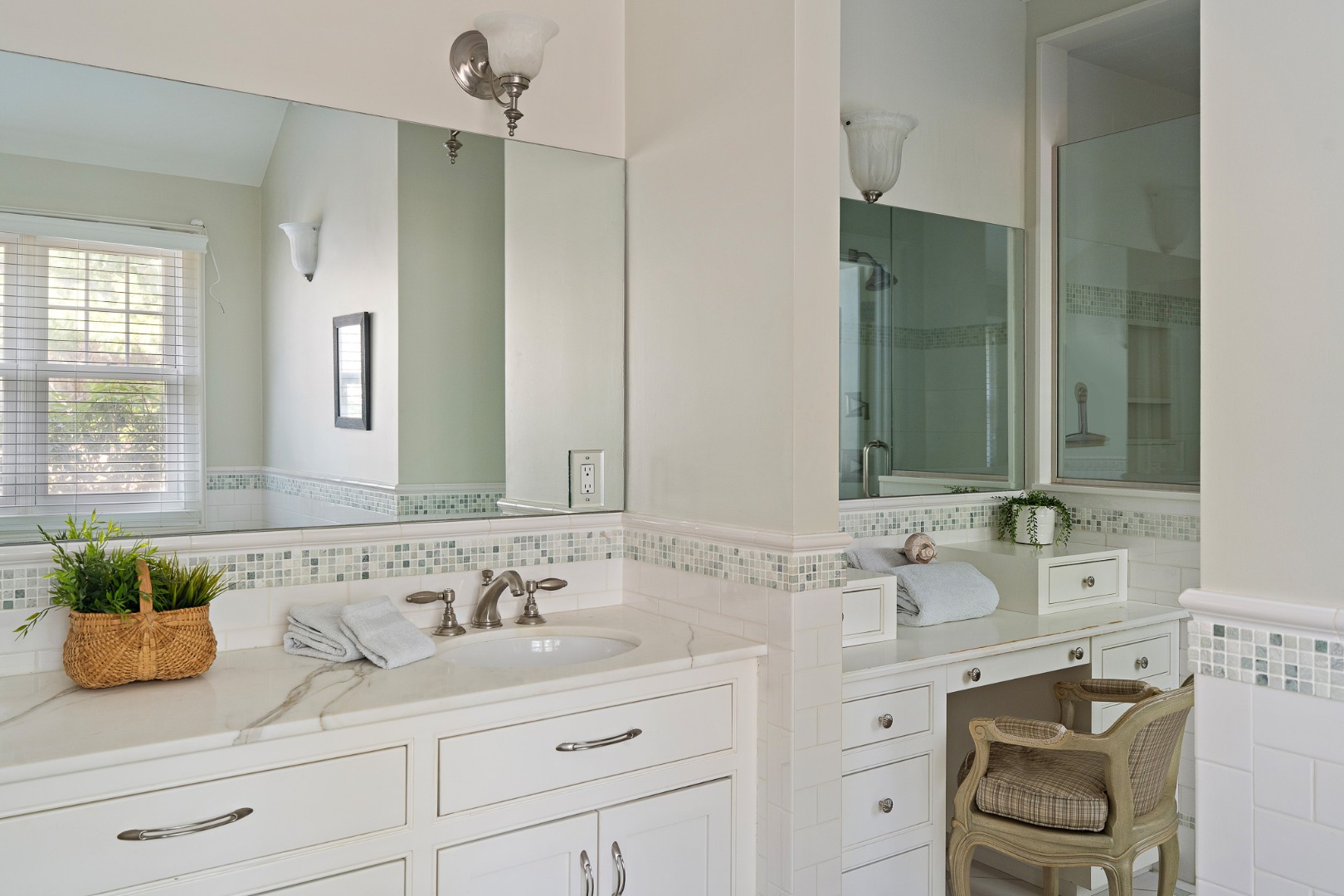 385 Barnes Road Oak Bluffs, MA 02557 - Photo 32 of 60 a bathroom with double vanity sink a mirror and double