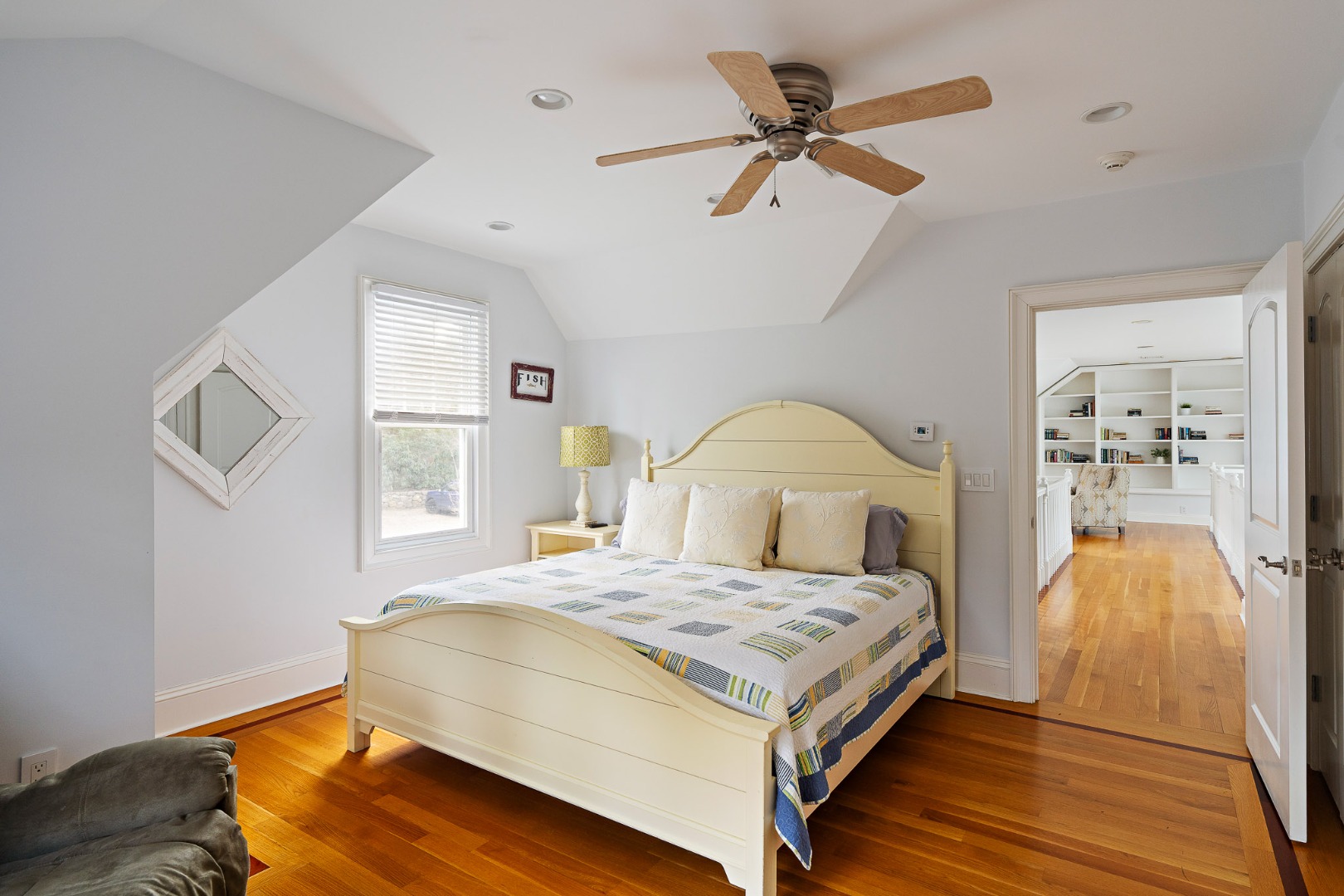 385 Barnes Road Oak Bluffs, MA 02557 - Photo 36 of 60 a bedroom with a bed and window