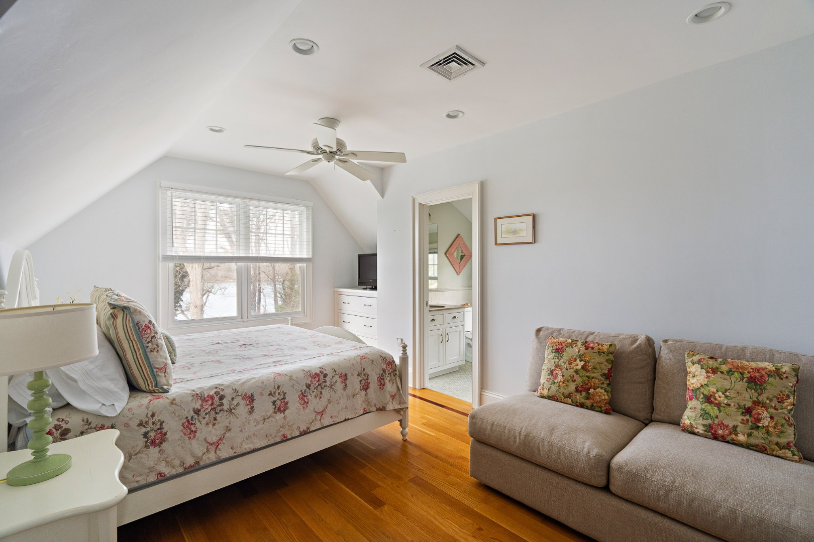 385 Barnes Road Oak Bluffs, MA 02557 - Photo 39 of 60 a bedroom with a bed couch and window