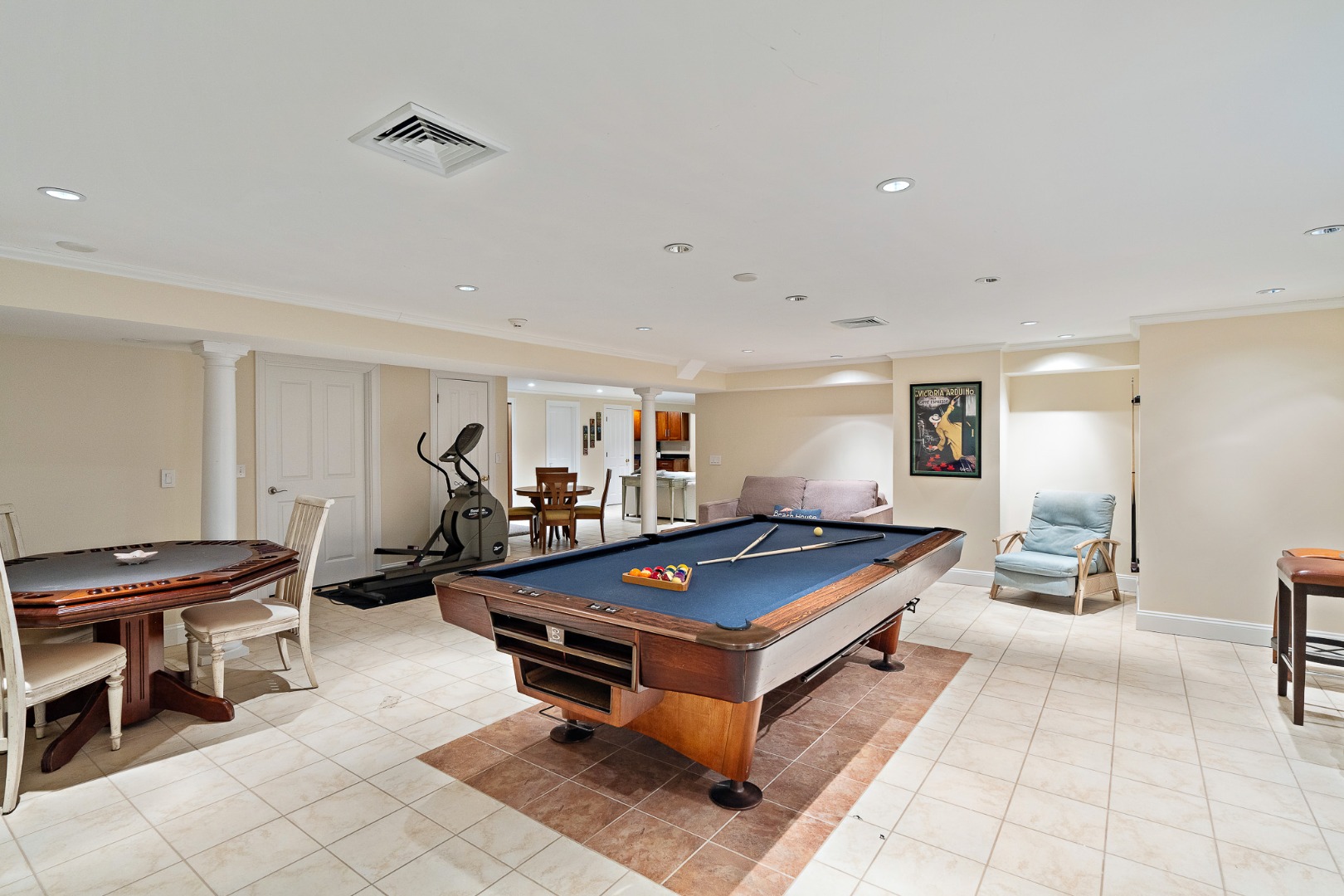 385 Barnes Road Oak Bluffs, MA 02557 - Photo 45 of 60 a living room with furniture a dining table and a piano