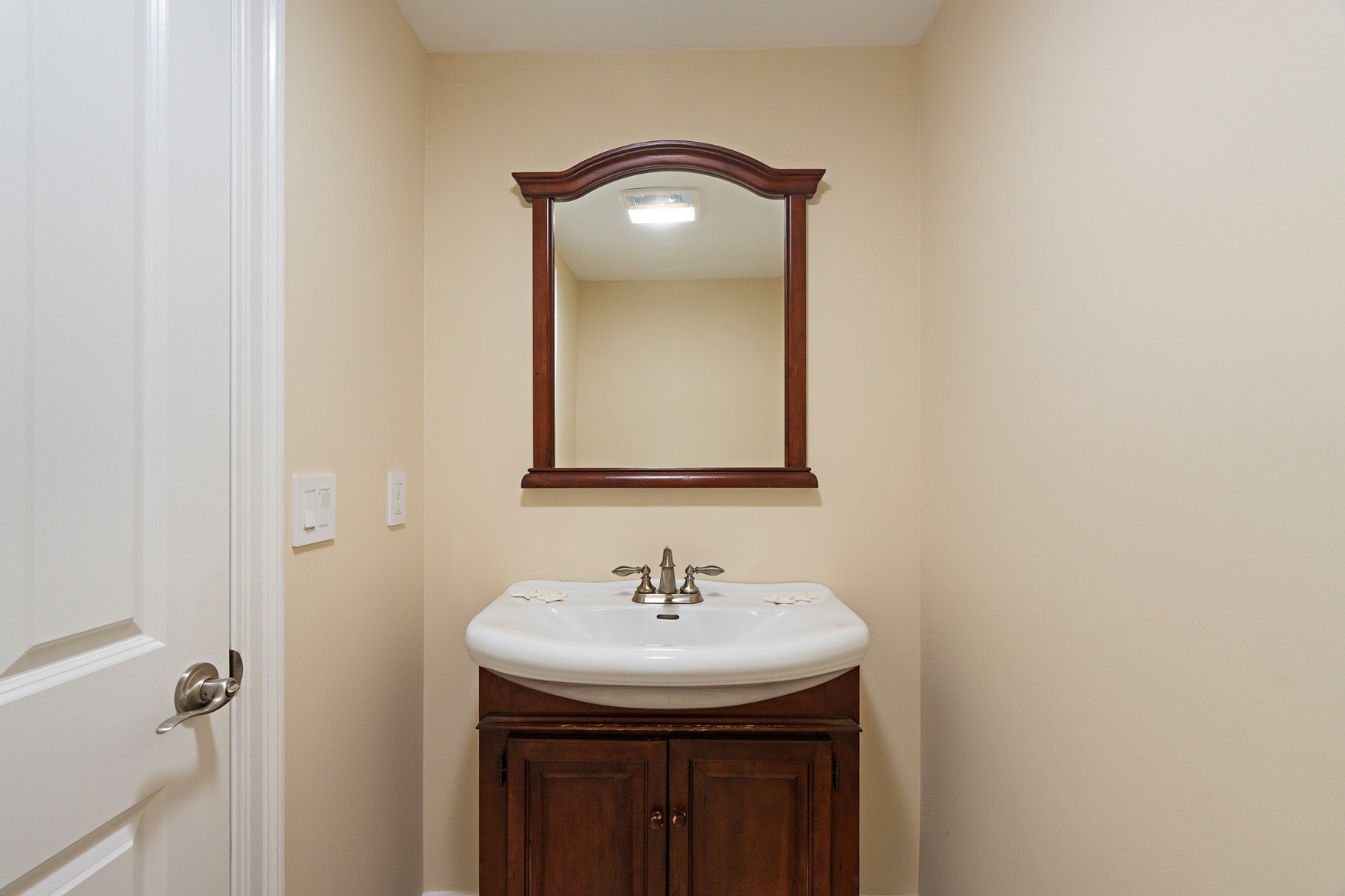 385 Barnes Road Oak Bluffs, MA 02557 - Photo 47 of 60 a bathroom with a sink and a mirror