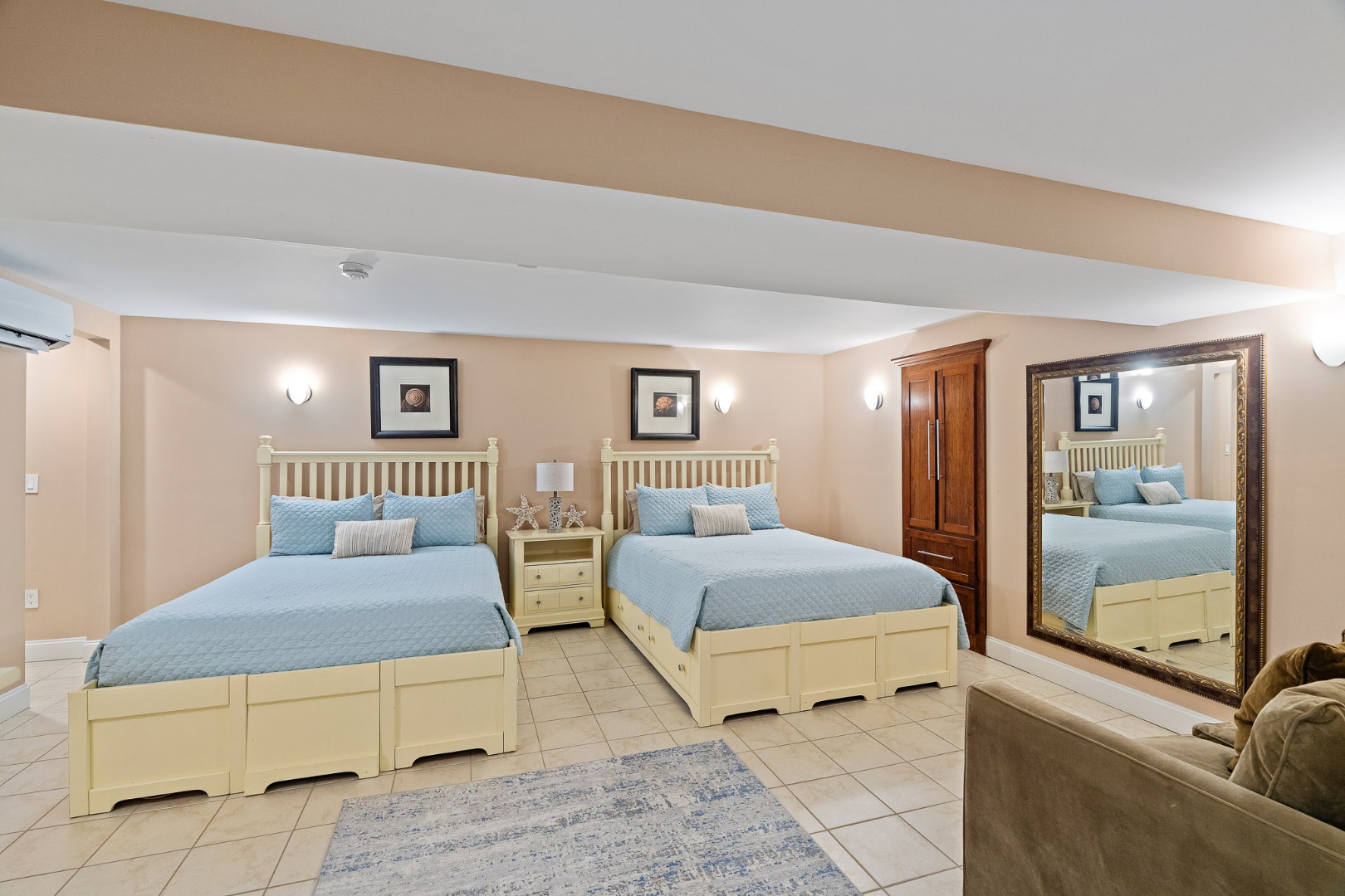 385 Barnes Road Oak Bluffs, MA 02557 - Photo 50 of 60 a bedroom with a large bed and a couch