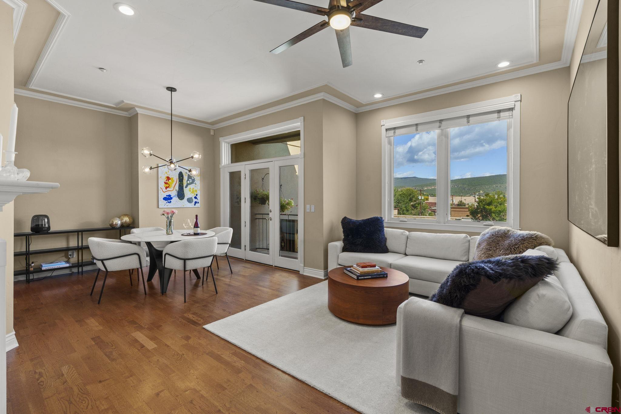 543 East 2nd Avenue, Unit 3E Durango, CO 81301 - Photo 1 of 39 a living room with furniture and a large window