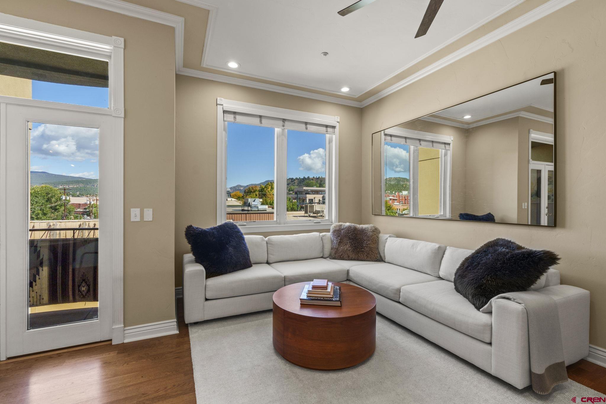 543 East 2nd Avenue, Unit 3E Durango, CO 81301 - Photo 2 of 39 a living room with furniture and a large window