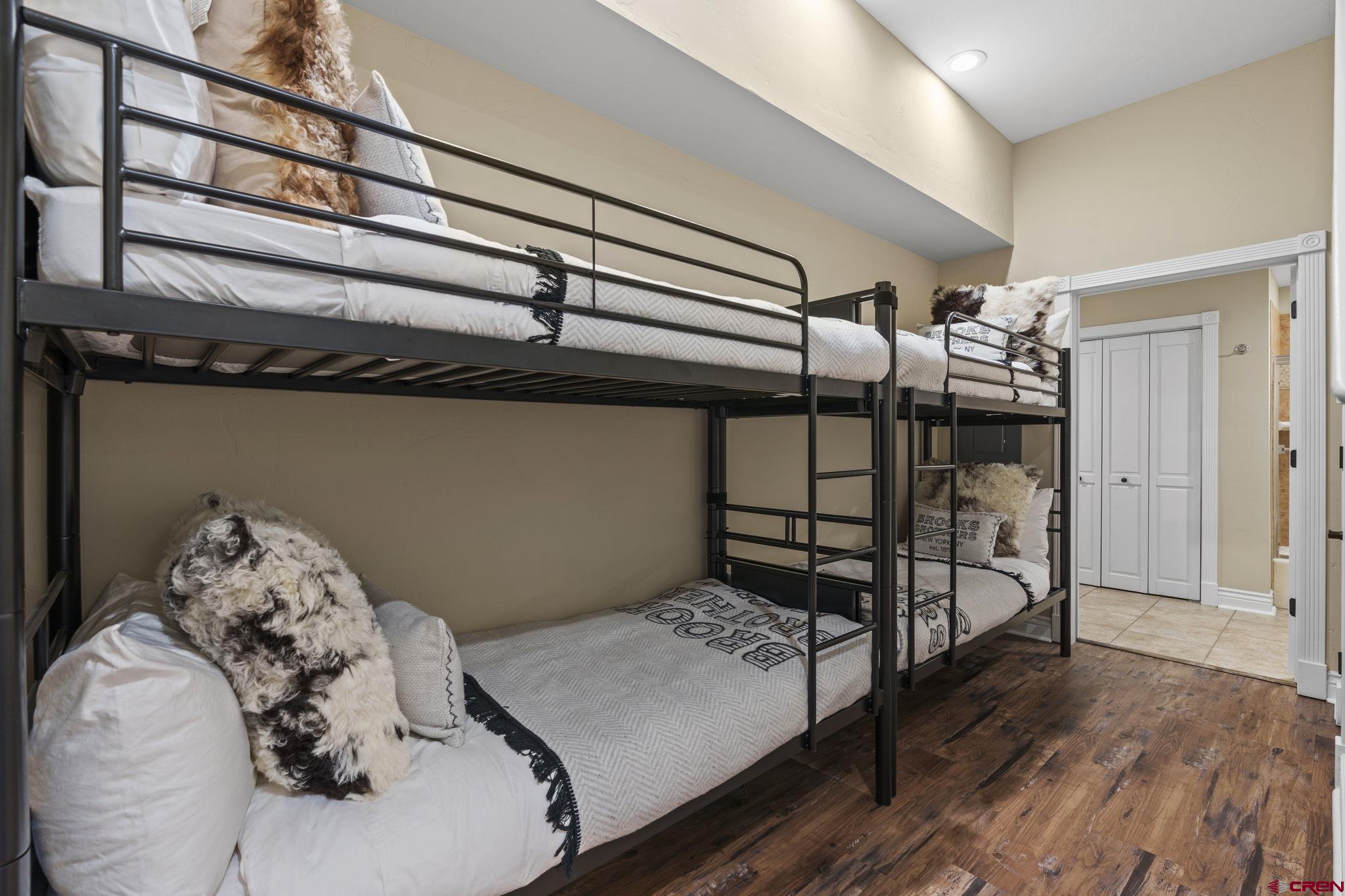 543 East 2nd Avenue, Unit 3E Durango, CO 81301 - Photo 26 of 39 a bedroom with a bed and a window