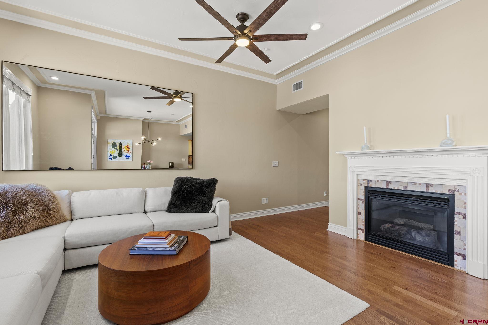 543 East 2nd Avenue, Unit 3E Durango, CO 81301 - Photo 3 of 39 a living room with furniture and a fireplace