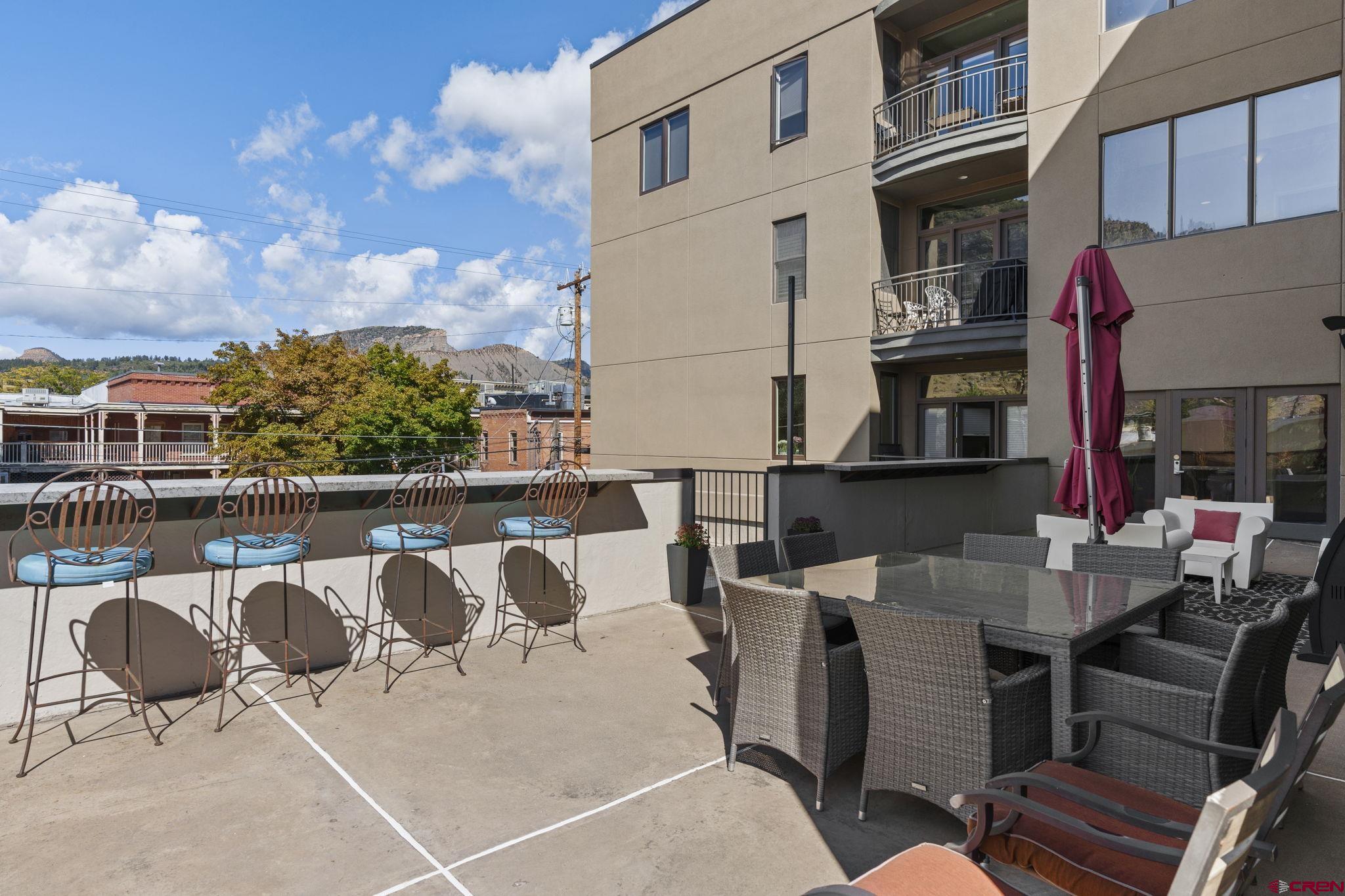 543 East 2nd Avenue, Unit 3E Durango, CO 81301 - Photo 33 of 39 a view of a chairs and table in the balcony
