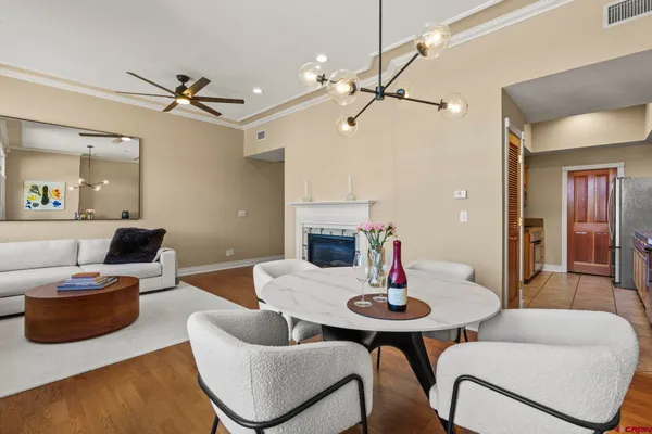 a living room with furniture and a table