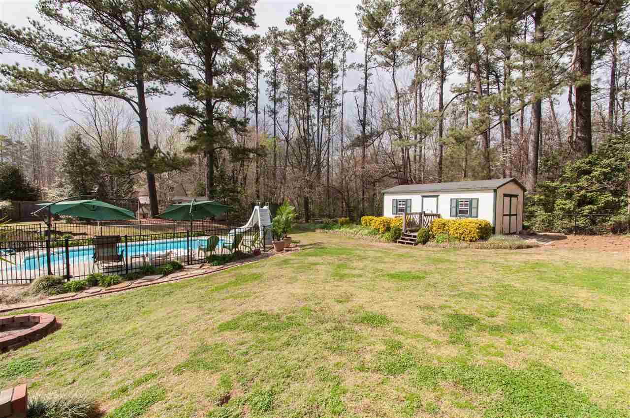 4001 Sue Lane Raleigh, NC 27604 - Photo 23 of 25 Fenced Backyard w/Multiple Sheds