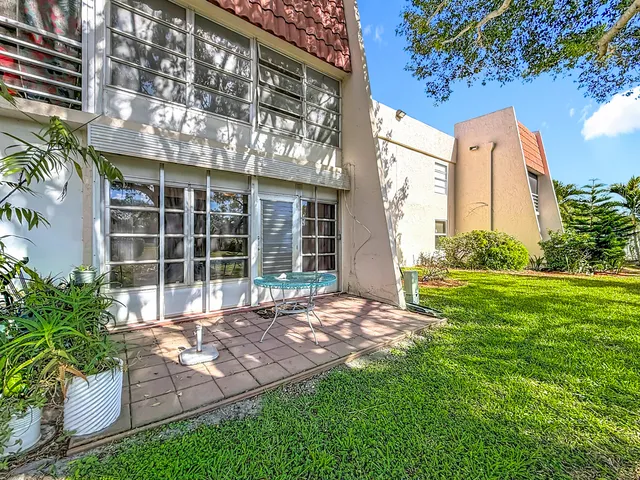 a bathroom with a toilet and a bathtub