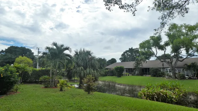 a view of a garden with houses