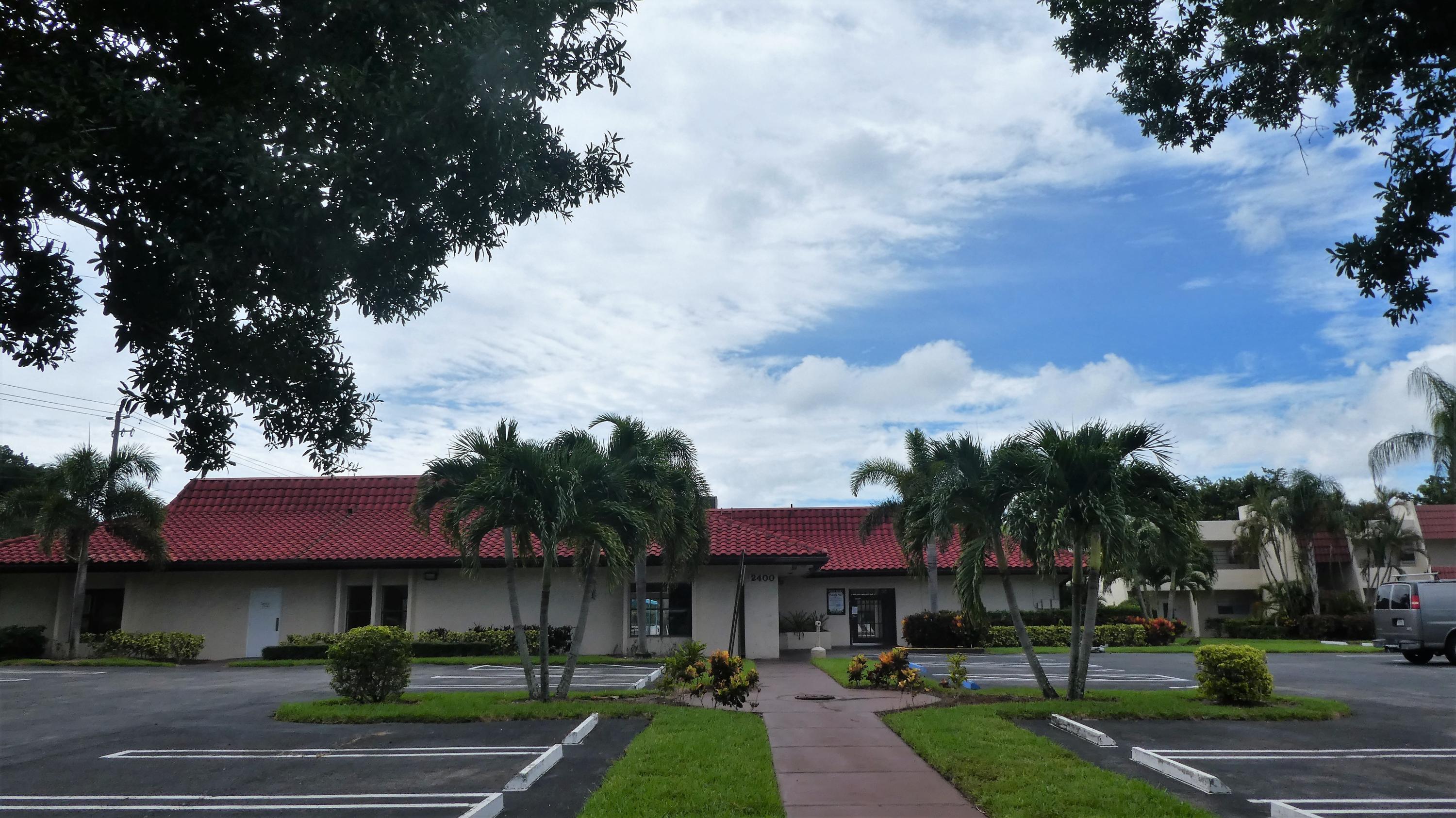 2500 Fiore Way, Unit 102C Delray Beach, FL 33445 - Photo 26 of 33 a view of a town with palm trees
