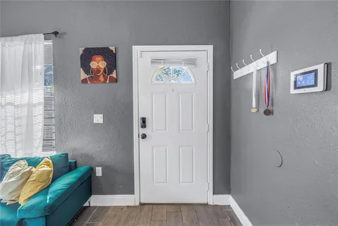 a view of livingroom with furniture and windows