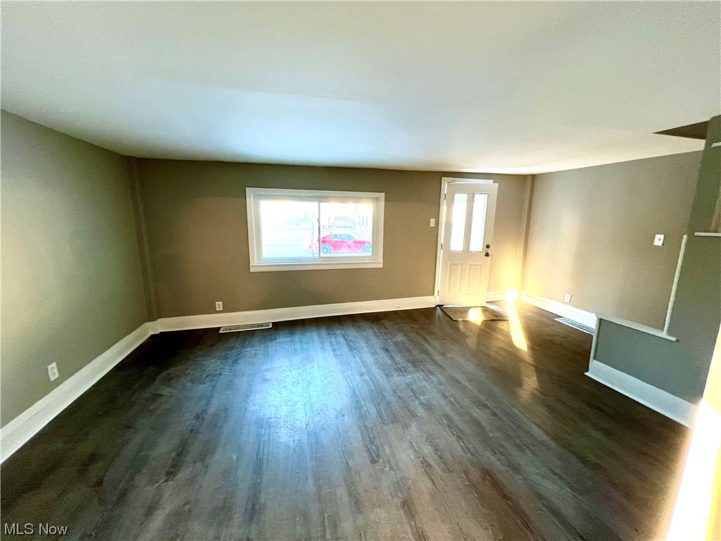 3527 Broadview Road Cleveland, OH 44109 - Photo 5 of 29 Unfurnished room featuring dark hardwood / wood-style floors
