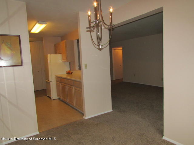 1412 Summit Pointe Scranton, PA 18508 - Photo 12 of 31 a bathroom with a sink and mirror