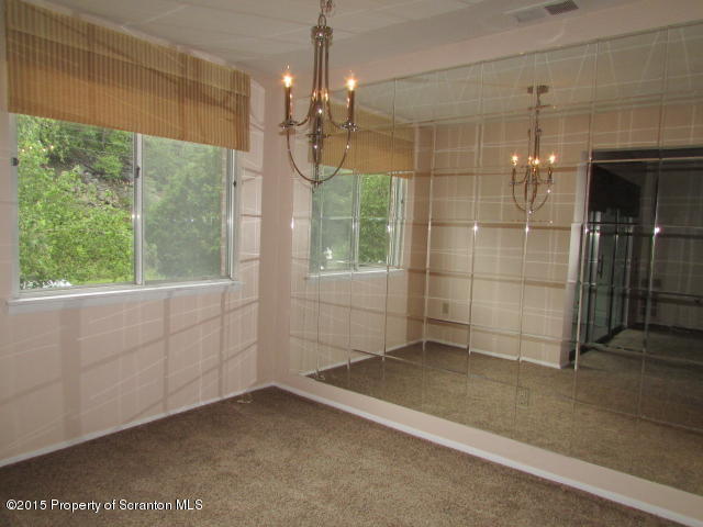 1412 Summit Pointe Scranton, PA 18508 - Photo 13 of 31 a view of a room with a garage