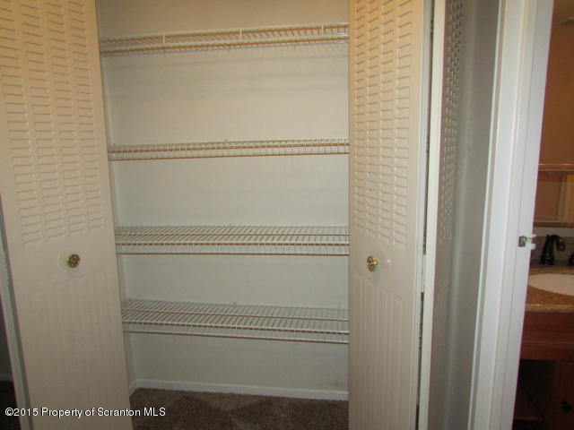 1412 Summit Pointe Scranton, PA 18508 - Photo 19 of 31 a bathroom with a glass shower door