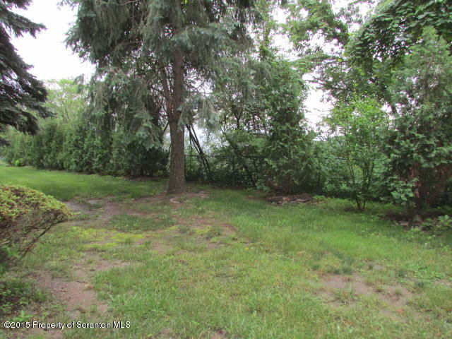 1412 Summit Pointe Scranton, PA 18508 - Photo 27 of 31 a view of outdoor space with deck and yard