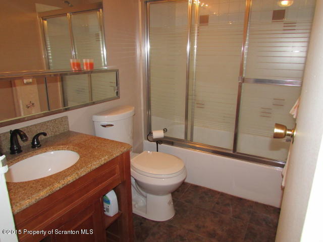 1412 Summit Pointe Scranton, PA 18508 - Photo 9 of 31 a bathroom with a sink and a mirror
