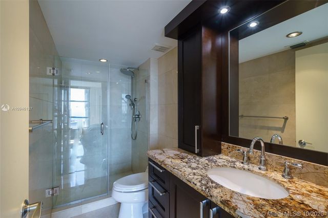 a view of a balcony with chairs