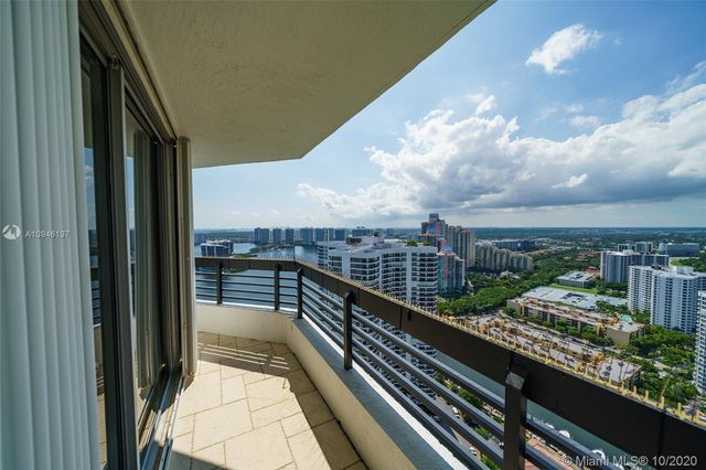 a view of a city with tall buildings