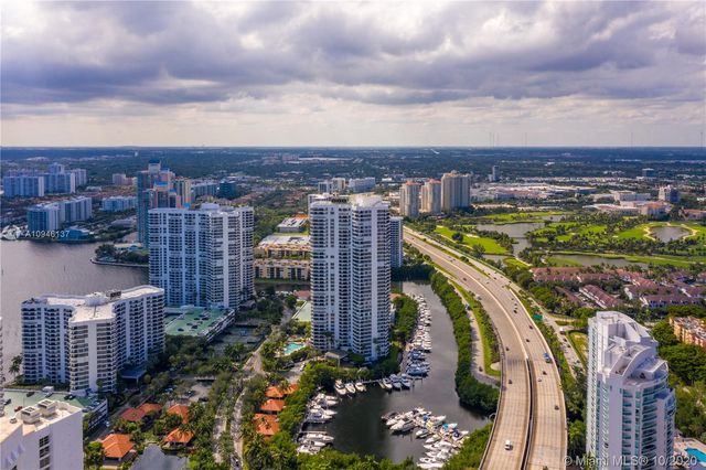 a view of a city with tall buildings