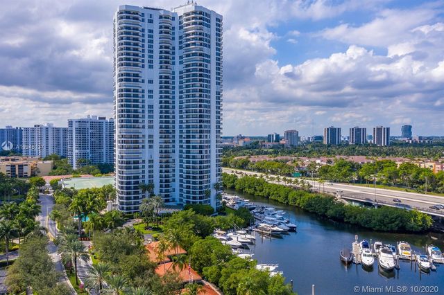an aerial view of a house with outdoor space