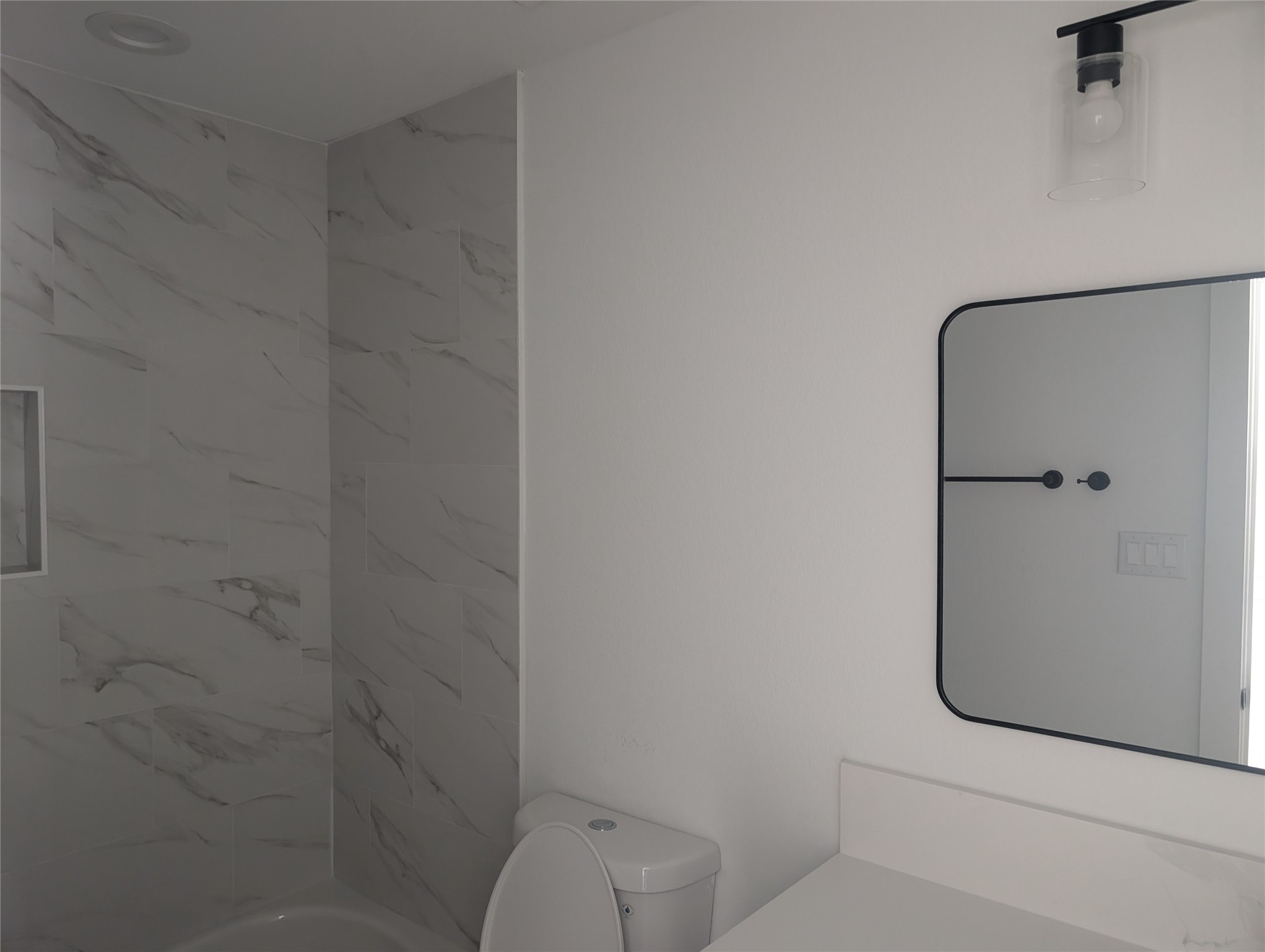 7813 Hirsch Road, Unit B Houston, TX 77016 - Photo 8 of 8 a bathroom with a shower and toilet