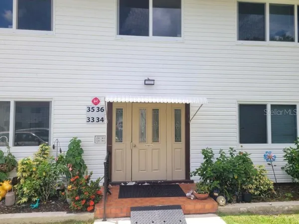 a front view of a house with garage