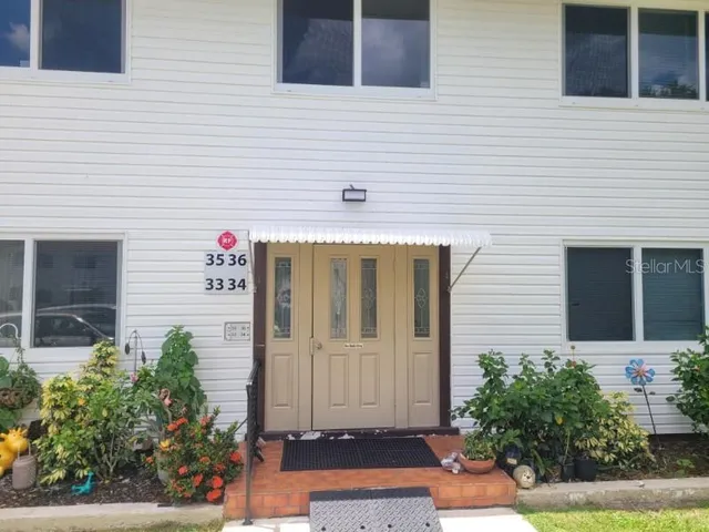 a front view of a house with garage
