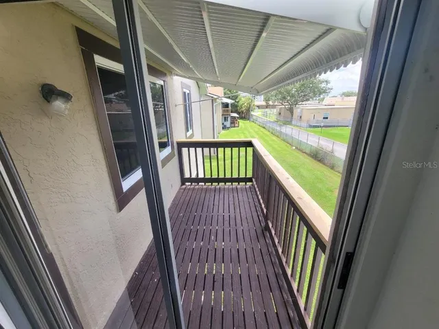a view of a big yard next to a house