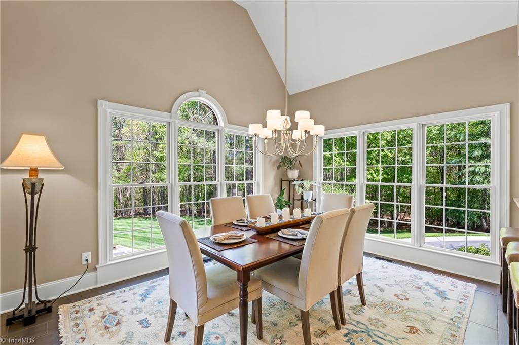 11555 Double Spring Road Lewisville, NC 27023 - Photo 14 of 50 Eat in kitchen with beautiful lighting from the oversized windows