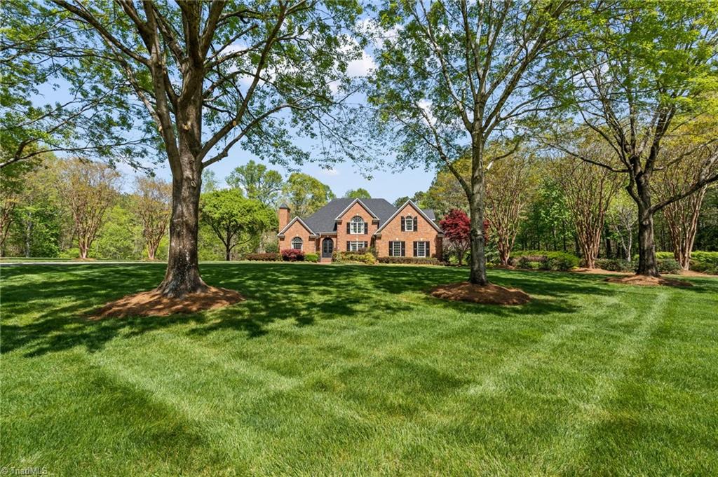11555 Double Spring Road Lewisville, NC 27023 - Photo 2 of 50 Professionally designed landscaping with irrigation system in place