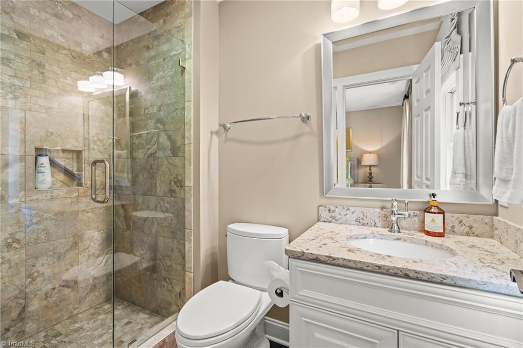 11555 Double Spring Road Lewisville, NC 27023 - Photo 29 of 50 Lovely en suite bathroom with walk in tiled shower
