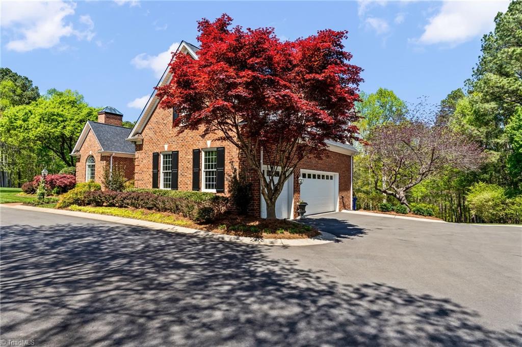11555 Double Spring Road Lewisville, NC 27023 - Photo 3 of 50 Recently paved circle drive to heated 3 car garage