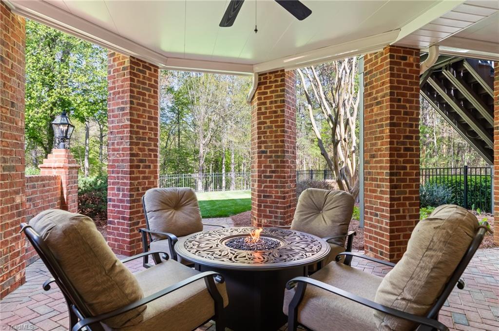 11555 Double Spring Road Lewisville, NC 27023 - Photo 36 of 50 Lower level patio with extensive lighting