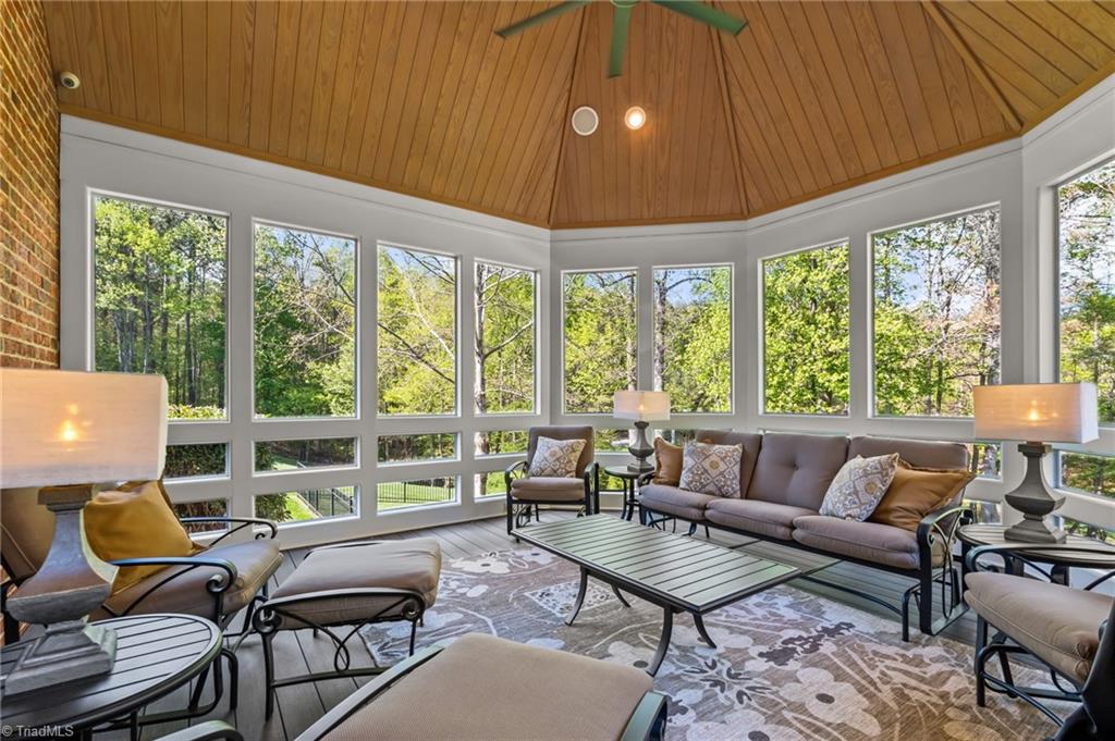 11555 Double Spring Road Lewisville, NC 27023 - Photo 40 of 50 The exceptional screened porch with low maintenance decking and vaulted ceiling offers extensive views of the property
