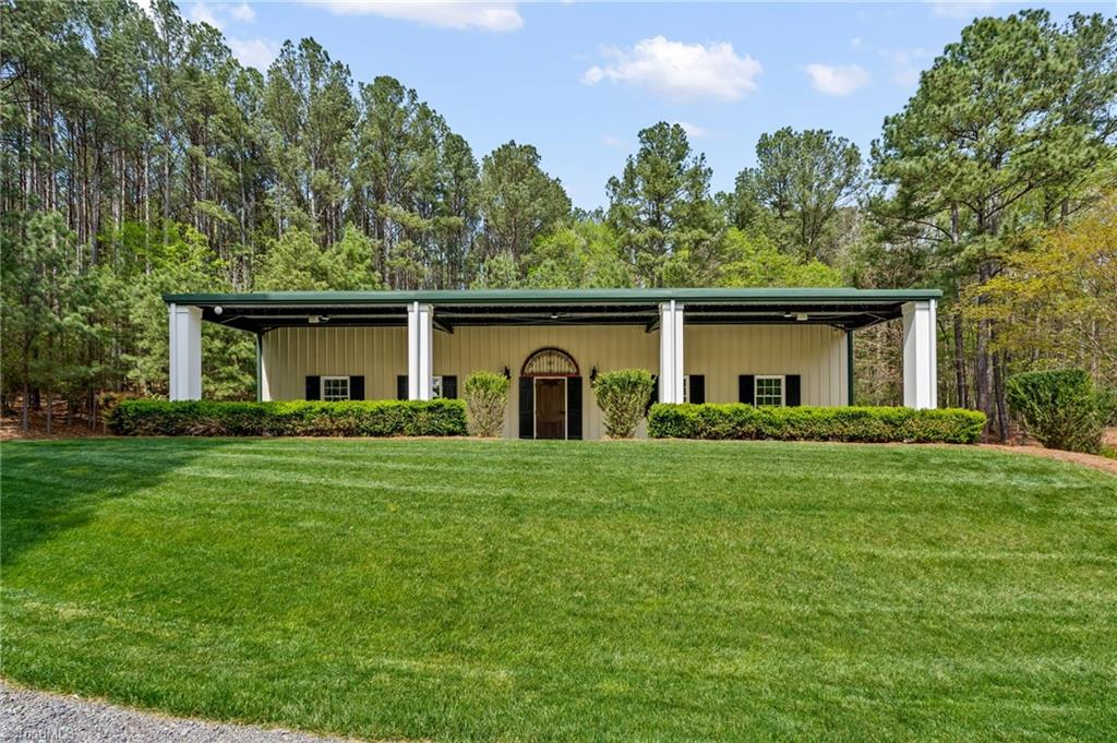 11555 Double Spring Road Lewisville, NC 27023 - Photo 43 of 50 60x40 insulated building with covered patio overlooks the pond
