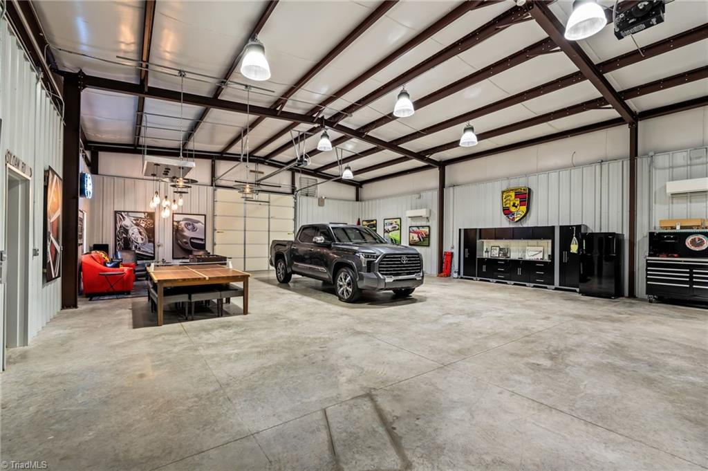 11555 Double Spring Road Lewisville, NC 27023 - Photo 44 of 50 Heated and cooled by dual mini splits, LED lighting, Sonos sound system, alarm, bathroom, garage bays, and separate septic system
