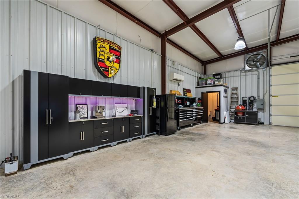 11555 Double Spring Road Lewisville, NC 27023 - Photo 45 of 50 Previously used as a sports car showroom, the possibilities are yours to create!