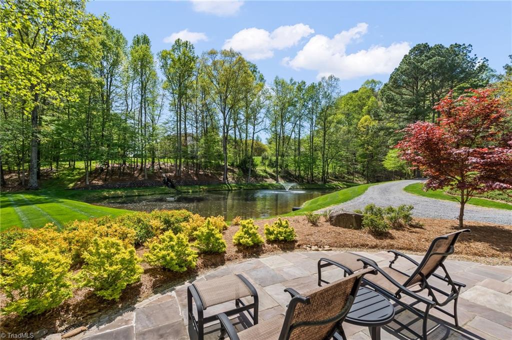 11555 Double Spring Road Lewisville, NC 27023 - Photo 47 of 50 Enjoy gorgeous views of the property with water features and outdoor speakers