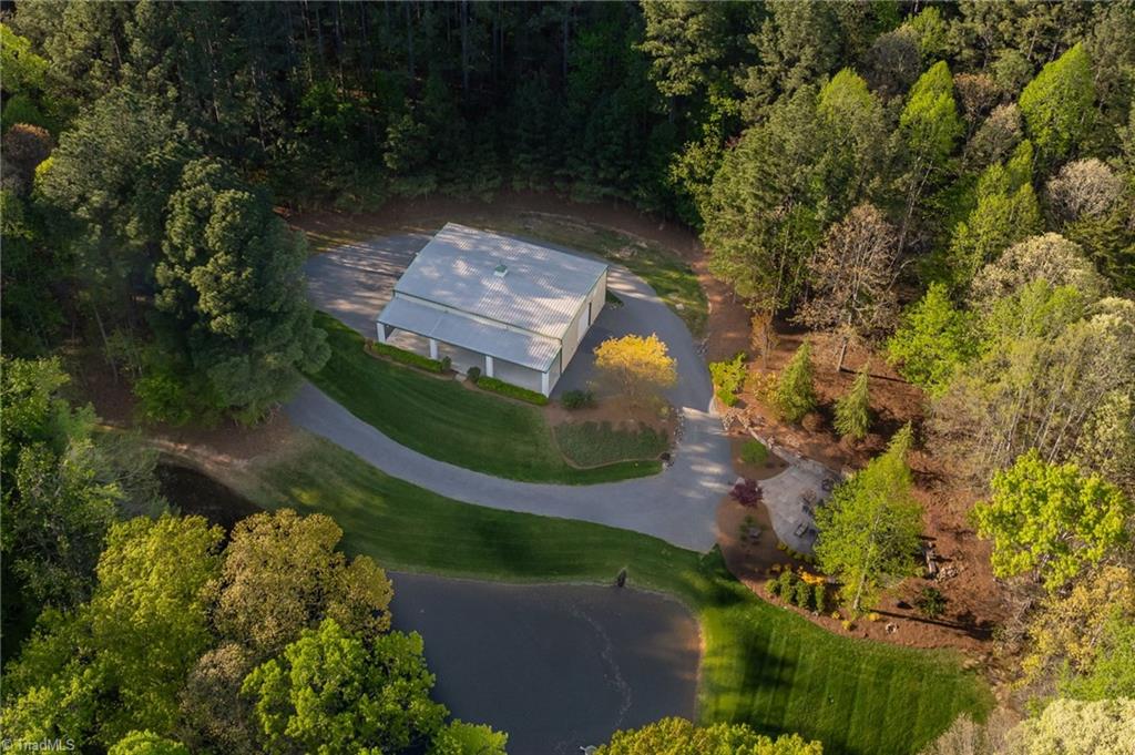 11555 Double Spring Road Lewisville, NC 27023 - Photo 50 of 50 The building has a separate gated entrance and a deep gravel drive with drainage in place.
