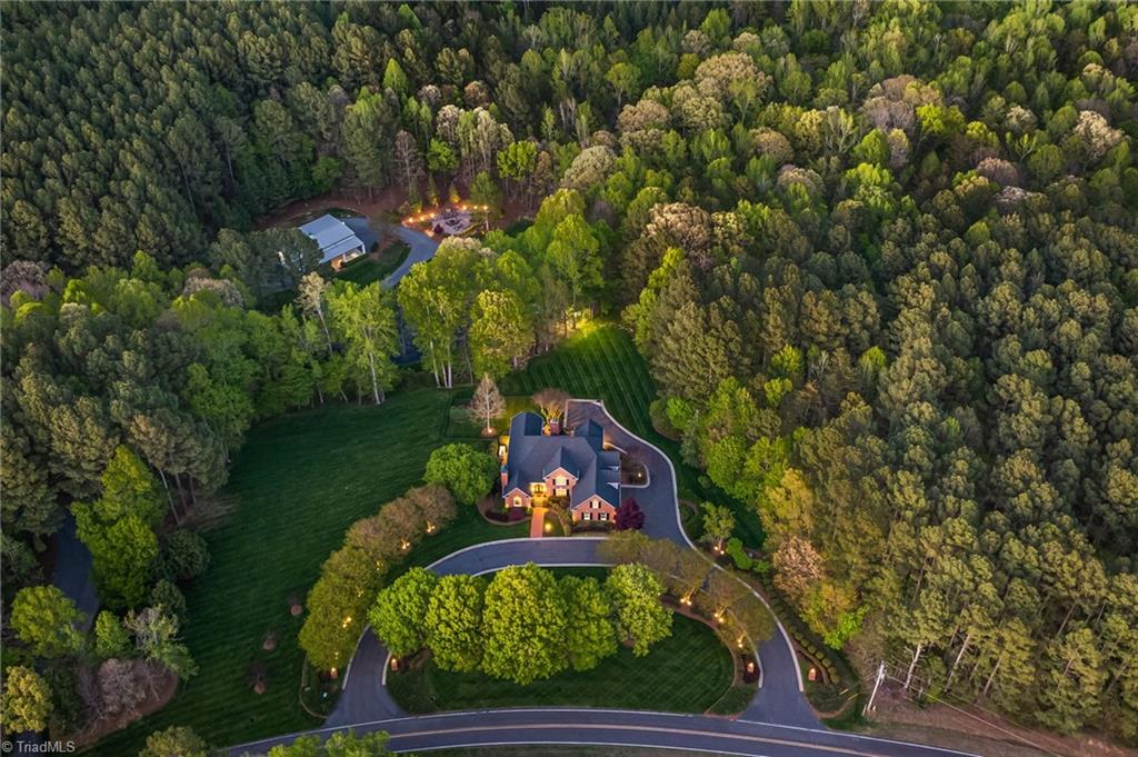 11555 Double Spring Road Lewisville, NC 27023 - Photo 6 of 50 The landscape is professionally, extensively, and beautifully lighted.