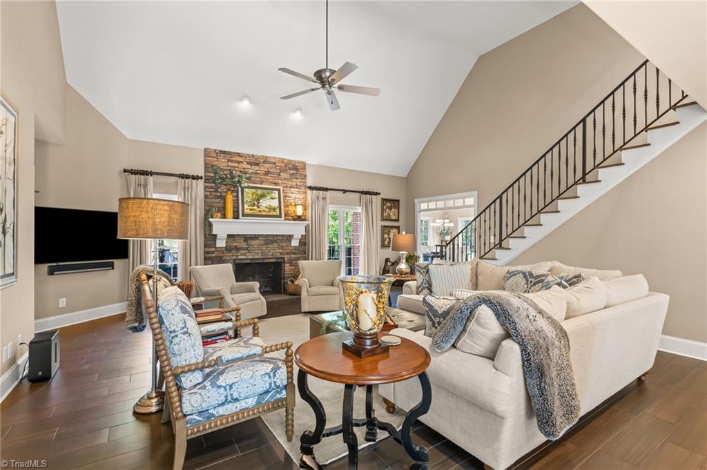 11555 Double Spring Road Lewisville, NC 27023 - Photo 10 of 50 Vaulted ceilings, stone fireplace with gas logs, and custom staircase built in 2014