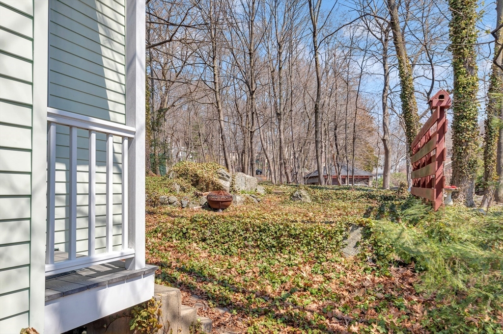 151-153 Forest Street Arlington, MA 02474 - Photo 17 of 20 a view of a backyard of the house
