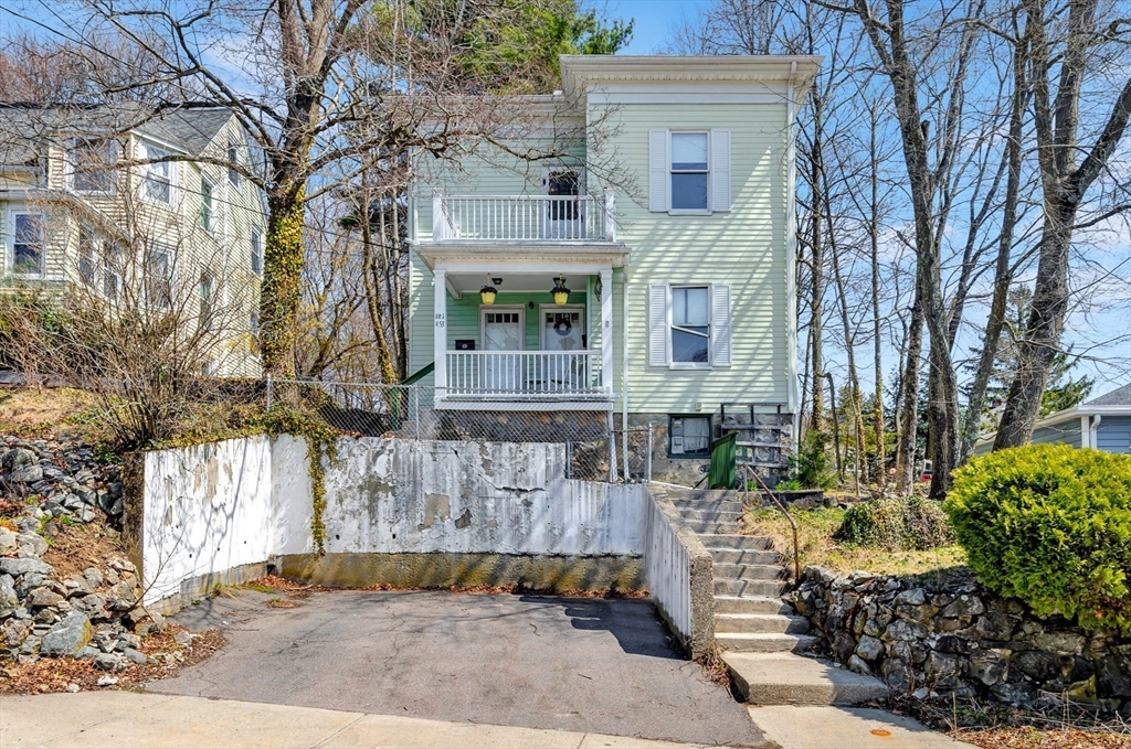 151-153 Forest Street Arlington, MA 02474 - Photo 19 of 20 a view of a house with a yard