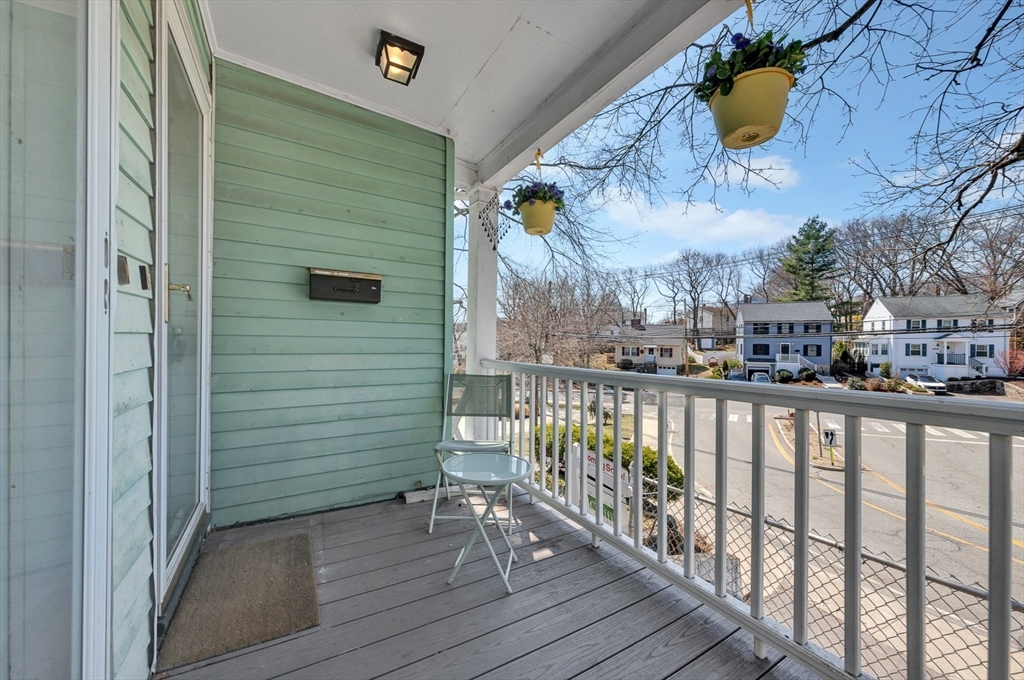151-153 Forest Street Arlington, MA 02474 - Photo 2 of 20 a view of a balcony with sitting area