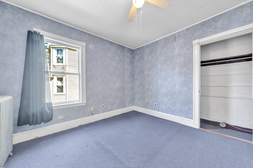 151-153 Forest Street Arlington, MA 02474 - Photo 9 of 20 an empty room with windows
