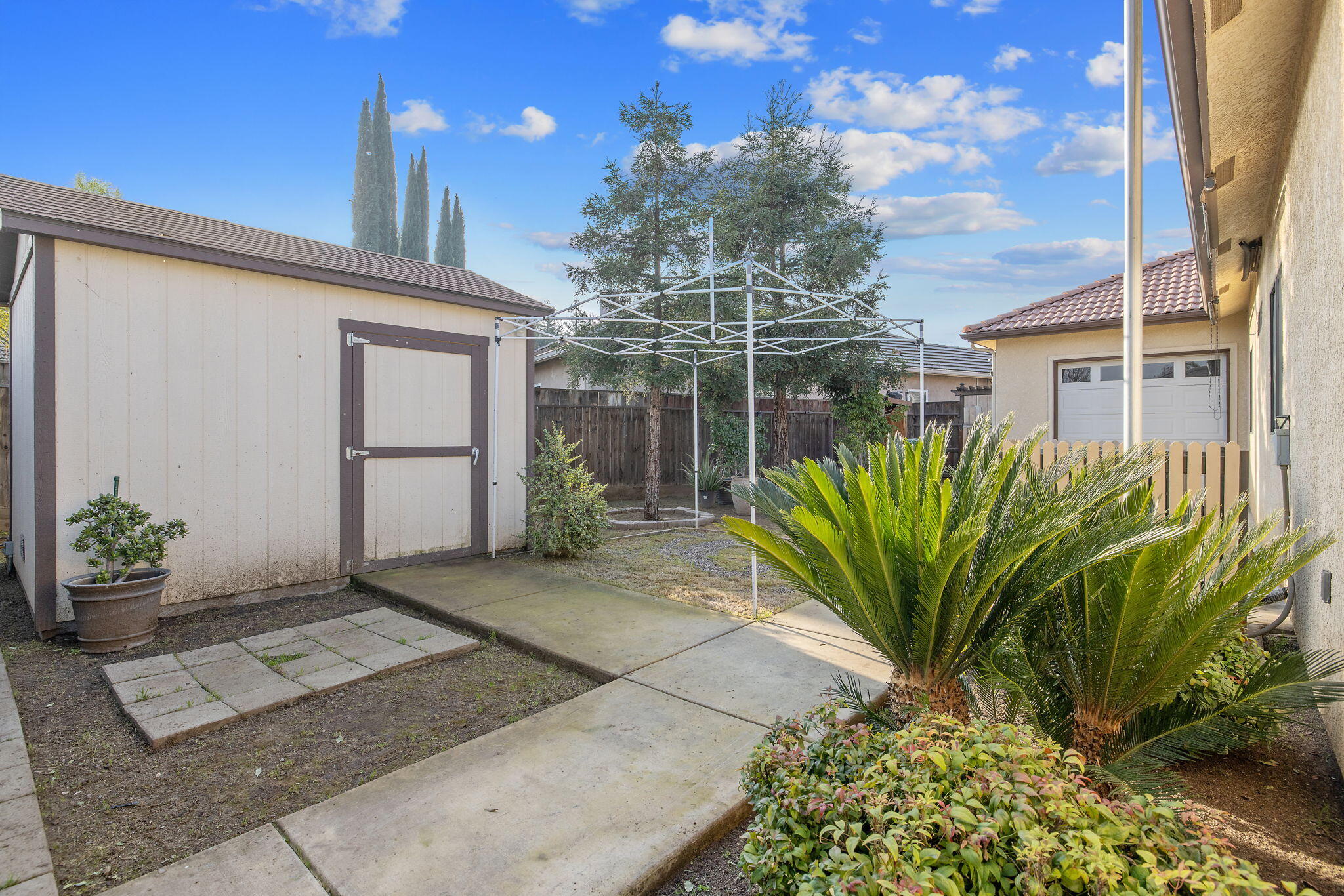 729 St Thomas Court Exeter, CA 93221 - Photo 57 of 66 a view of a entryway in front of house