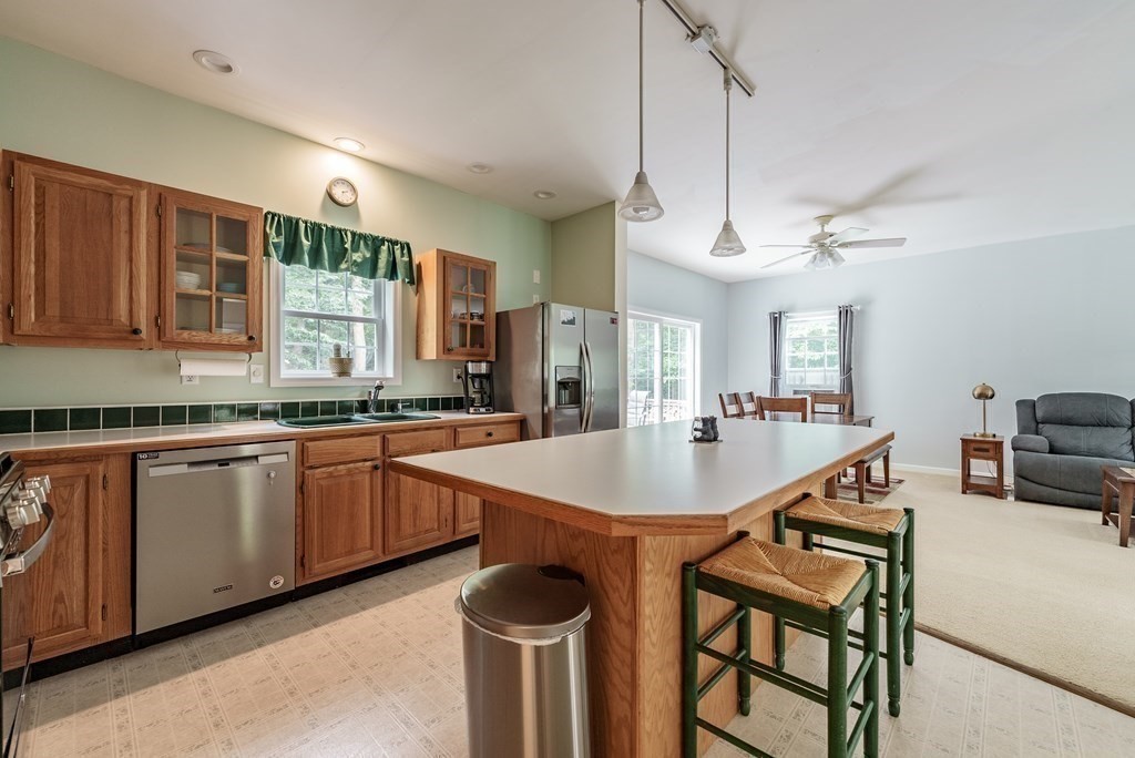 870 George Carter Road Becket, MA 01223 - Photo 10 of 37 a kitchen with a sink a counter space and appliances